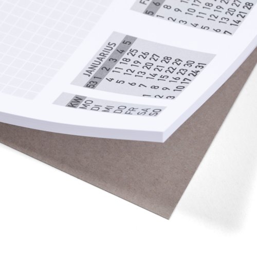 Papieren bureau onderlegger met kalender.