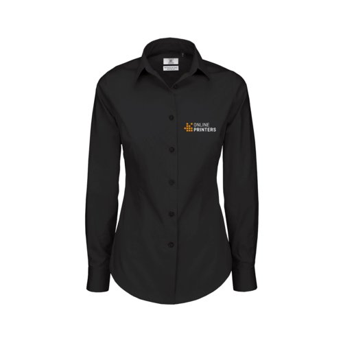 Zwarte stoffen blouse met lange mouwen en knoopsluiting.
