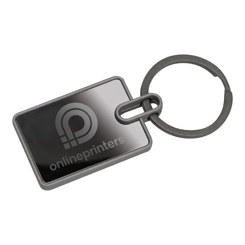Antracietkleurige metalen sleutelhanger met rechthoekige vorm en sleutelring.