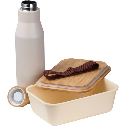 Beige lunchbox met roestvrijstalen fles en bamboe deksel.